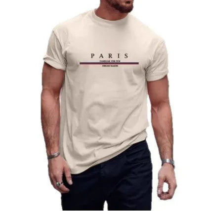 Man modelling a loose-fit, short-sleeved, letter-print T-shirt in pure cotton, shown in apricot colour.