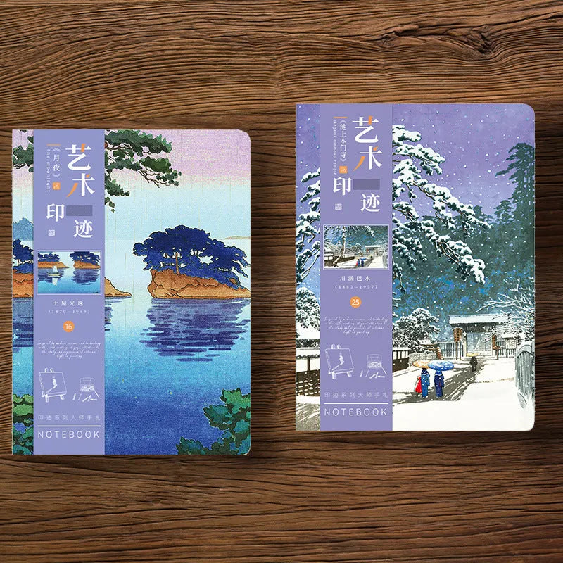 Ukiyo-e art hand ledger notebook open on a desk showing detailed Kanagawa wave cover and lined pages.