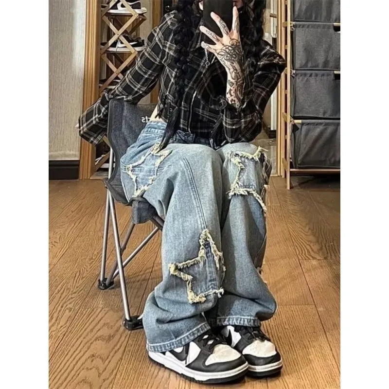 Blue high-waist wide-leg denim jeans with straight cut on hanger