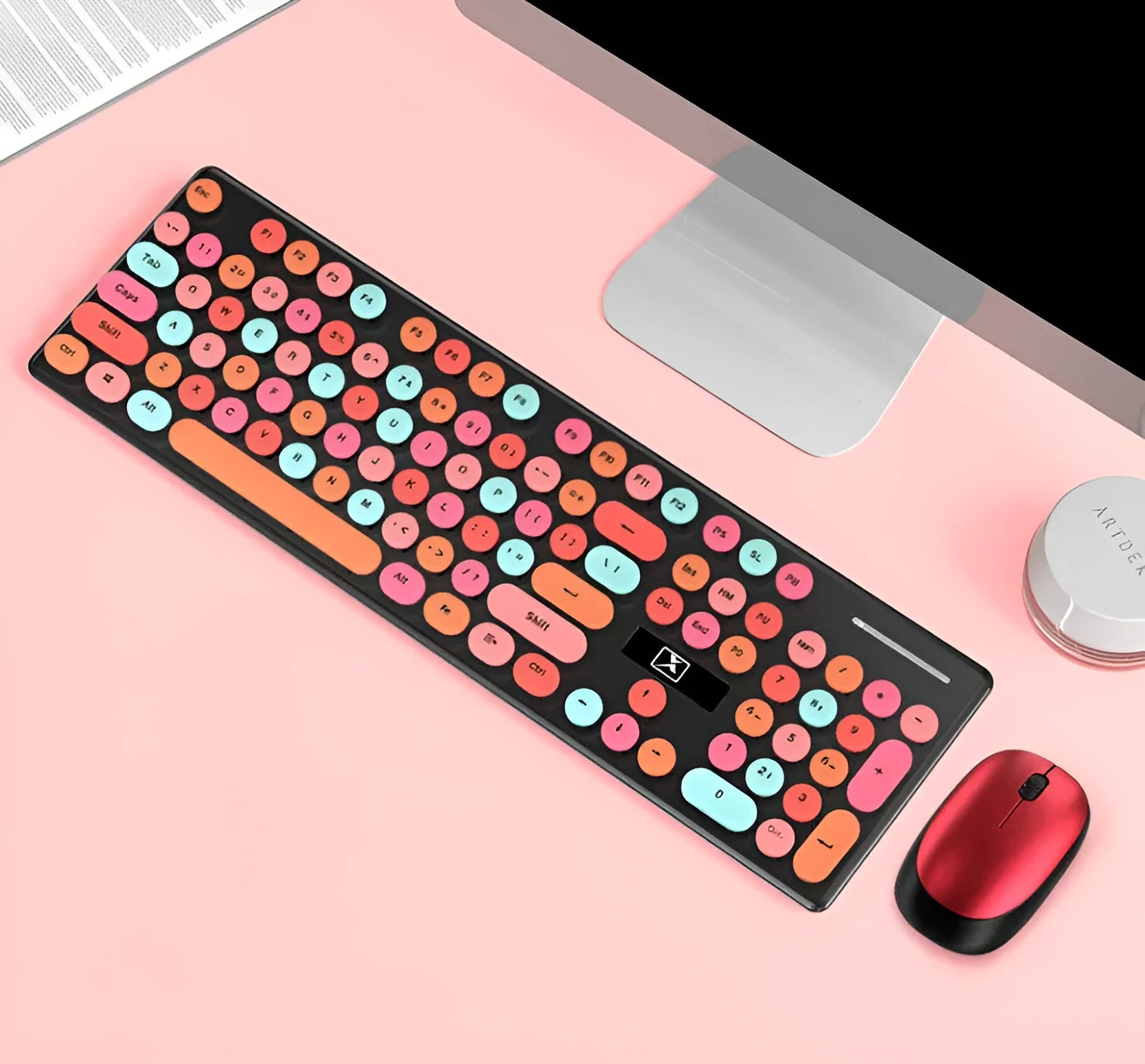 Vibrant yellow wireless punk manipulator keyboard and mouse set on a desk.