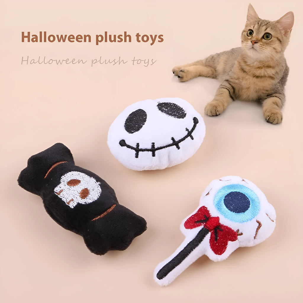 Small plush candy cat teaser wand on a stick in one of three colour designs: Eyes, Candy, or Skull.