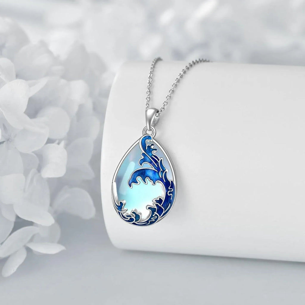 Moonstone blue alloy heart pendant on a women's necklace.