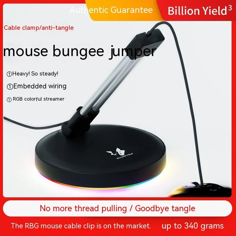 Black and white ABS plastic mouse cable holder bracket for wired gaming mice on a desk.