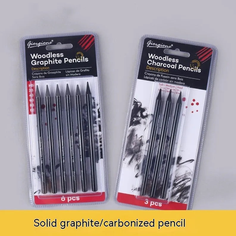 Set of graphite and carbonized drawing pencils with wooden barrels on suction card packaging