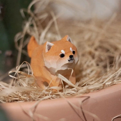 Handcrafted sandalwood kitten ornaments in various styles and colours