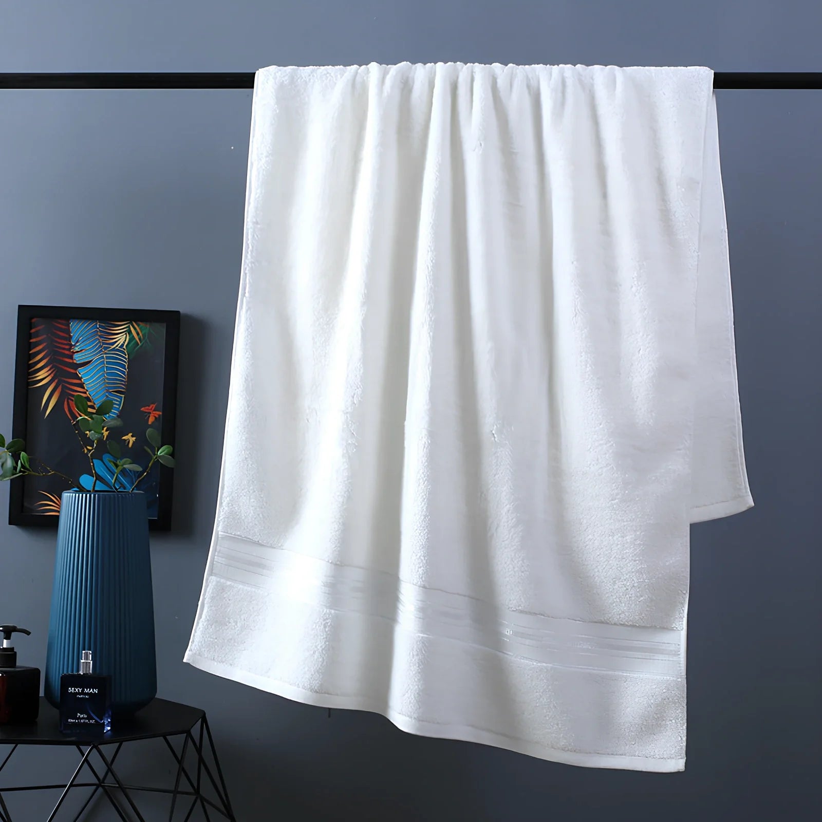 Three-piece cotton bath towel set in blue, featuring 70x150cm bath towel, 34x75cm hand towel, and 34x35cm square scarf for absorbent drying