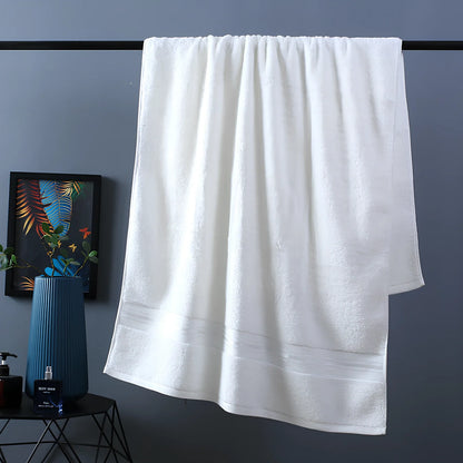 Three-piece cotton bath towel set in blue, featuring 70x150cm bath towel, 34x75cm hand towel, and 34x35cm square scarf for absorbent drying