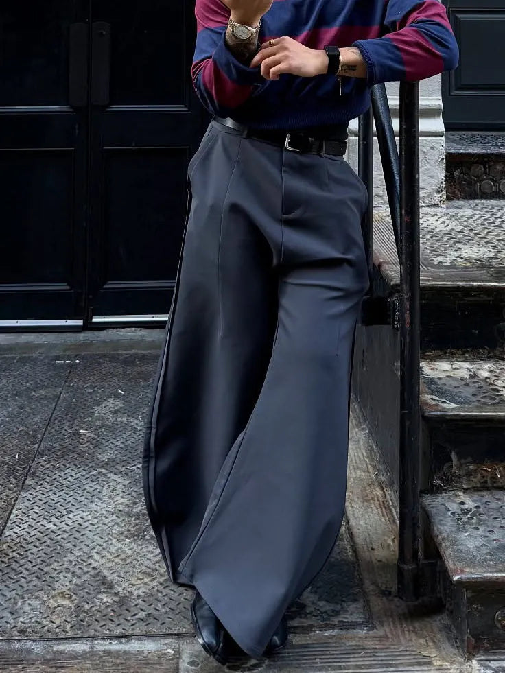 Grey scimitar wide-leg pants made of polyester with regular fit, plain design for casual daily wear.