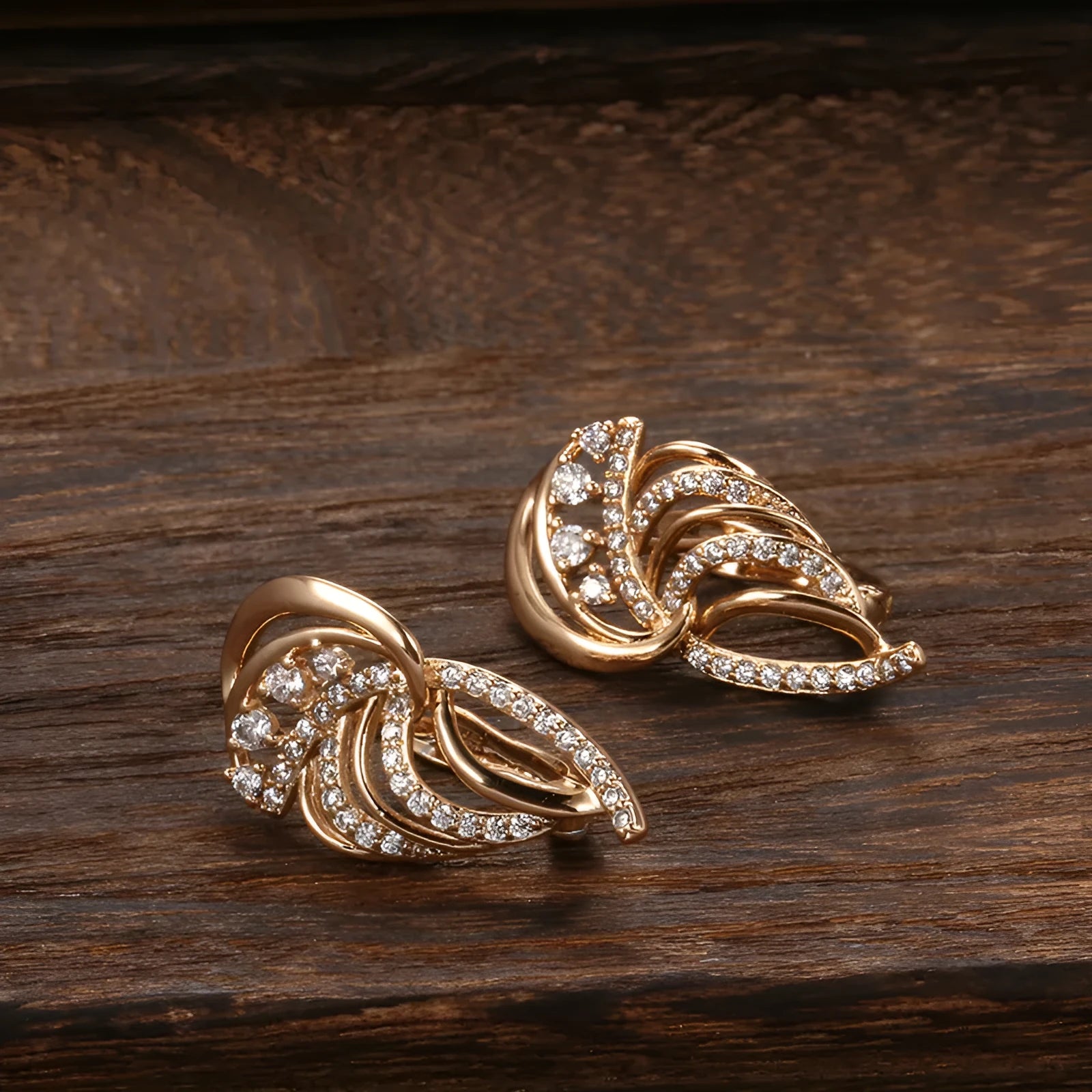 Women's copper U-shaped ear clips with wing design and micro zircon stone detailing in H0195 colour
