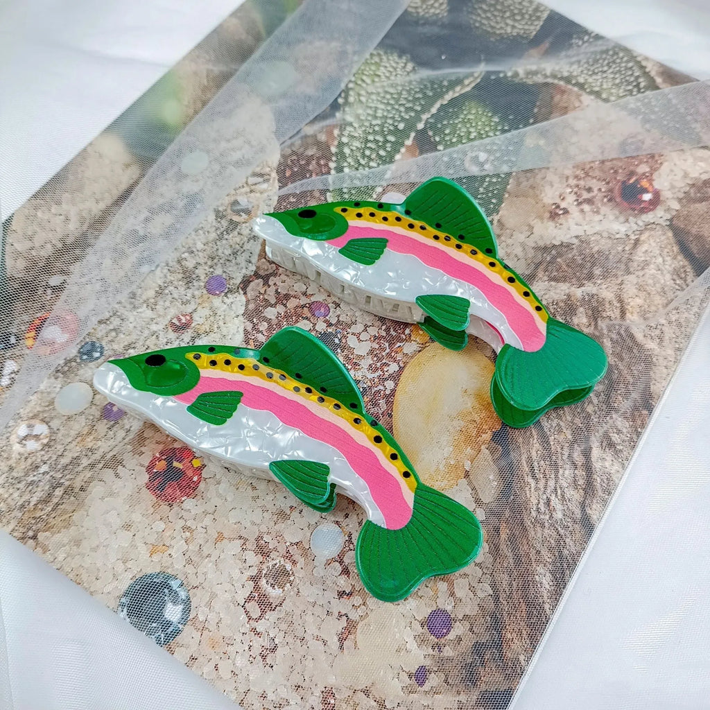 Dark green women's hair clip with detailed printed rainbow trout and carp marine design