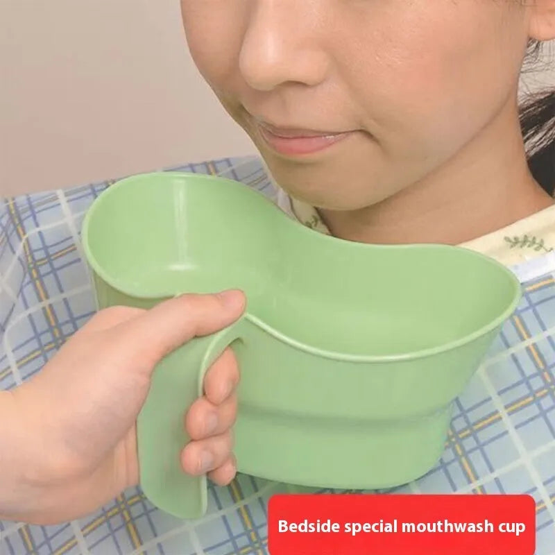 Green plastic nursing mouthwash cup with spout for bedridden patient oral care