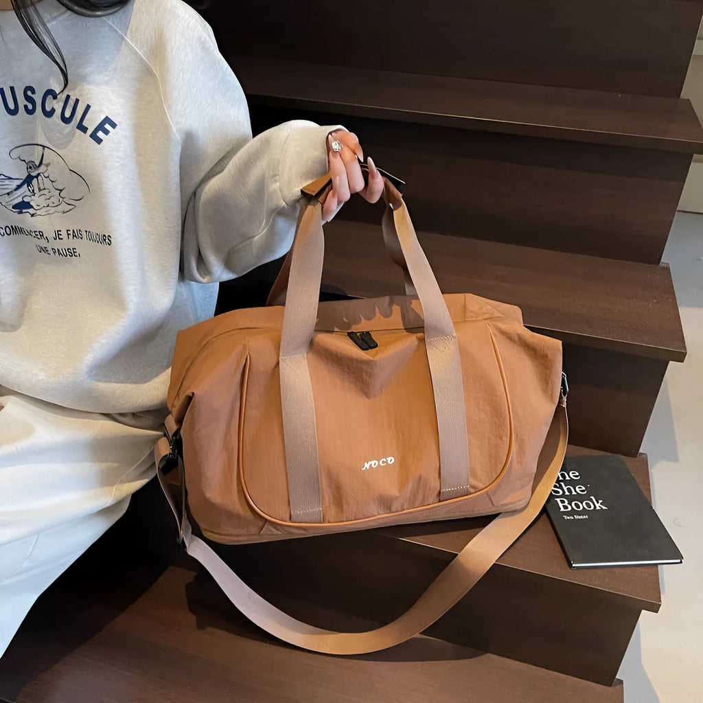 Oxford cloth one shoulder crossbody bag in beige, shown for yoga or travel use