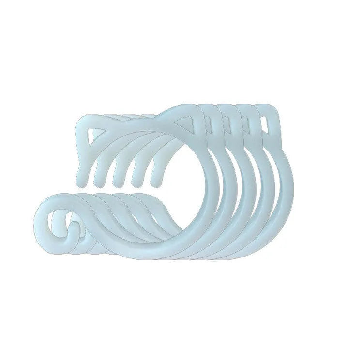A green cat-shaped plastic plant clip for securing stems to garden supports.