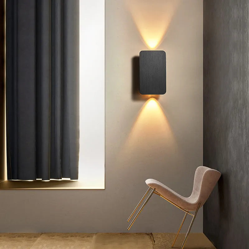 Slim minimalist wall-mounted LED lamp in black finish, showcasing Nordic design.