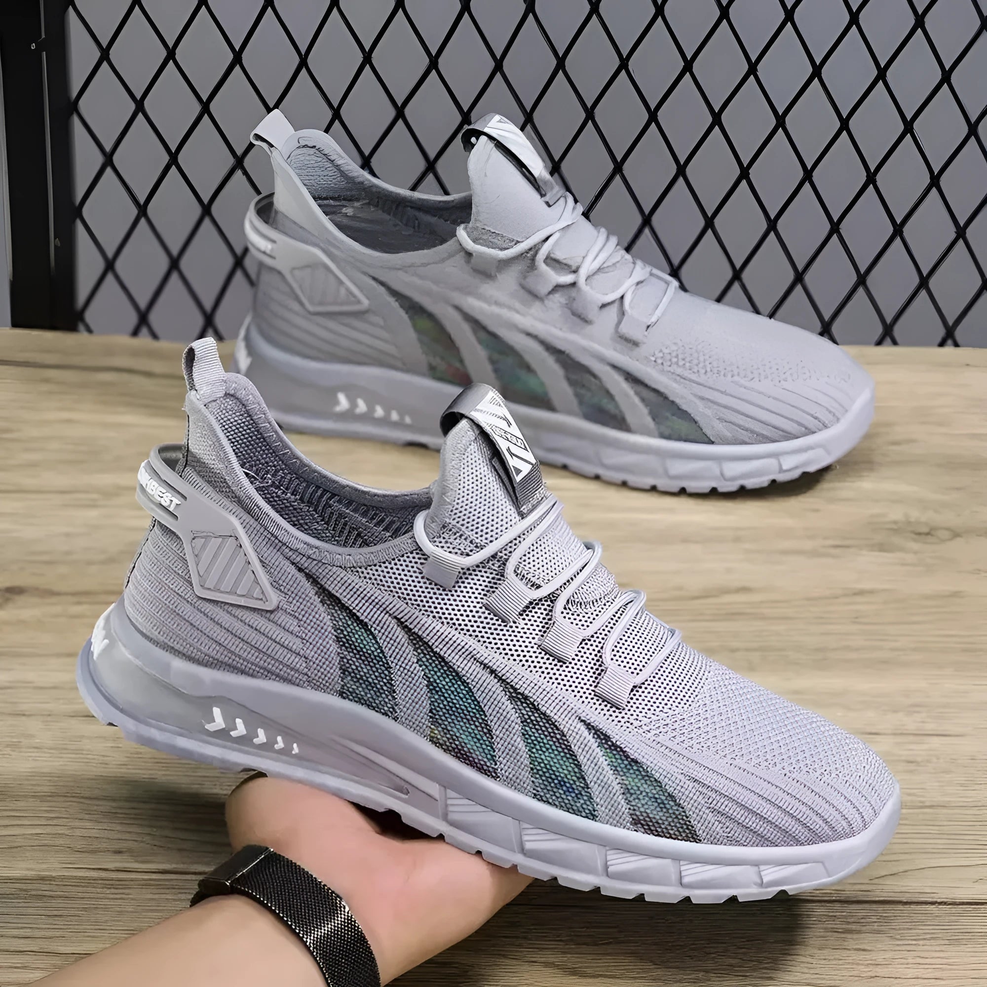 Men's low-top mesh sneakers in black, gray and beige colours with flat plastic sole