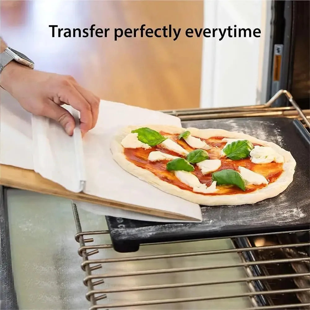 Natural wood pizza transfer shovel measuring 55cm with hanging hole for storage