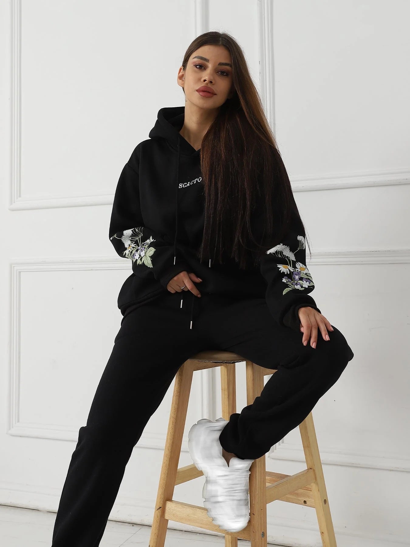 Women's solid colour floral long sleeved sweatshirt in black, blue, apricot