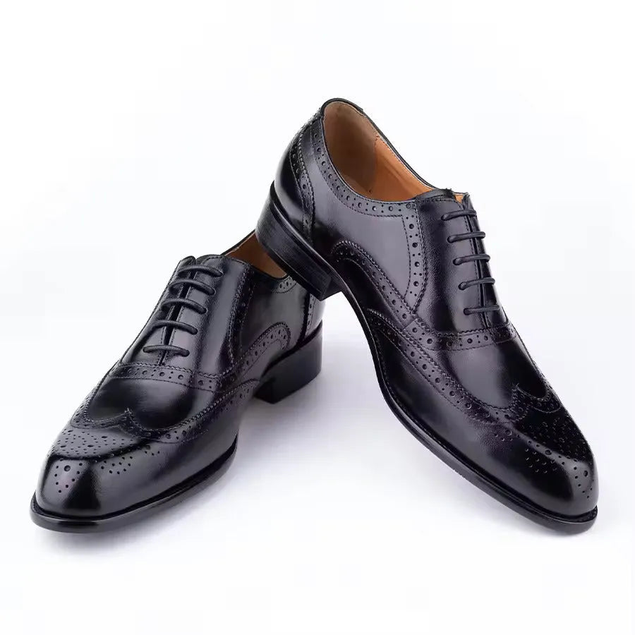 Men's purple leather Oxford shoes with hand-carved detailing and pointed toe