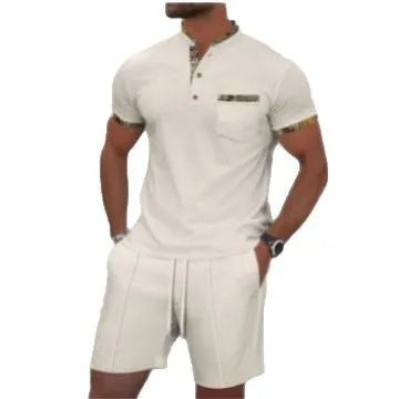 Man wearing a grey waffle-texture zip polo and matching shorts from a cotton blend summer suit set.