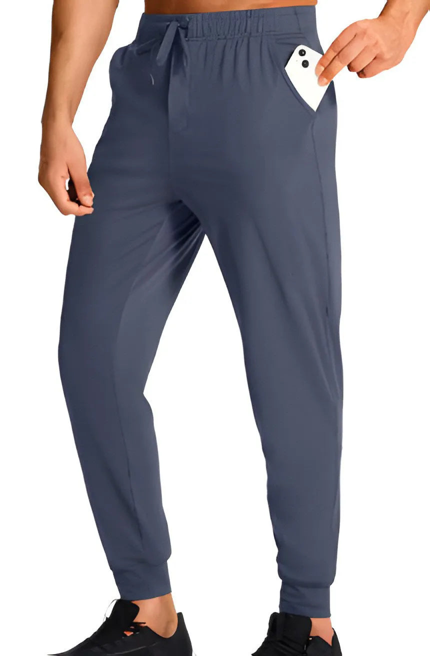 Men's loose casual polyester trousers in solid colour with relaxed fit for leisure wear