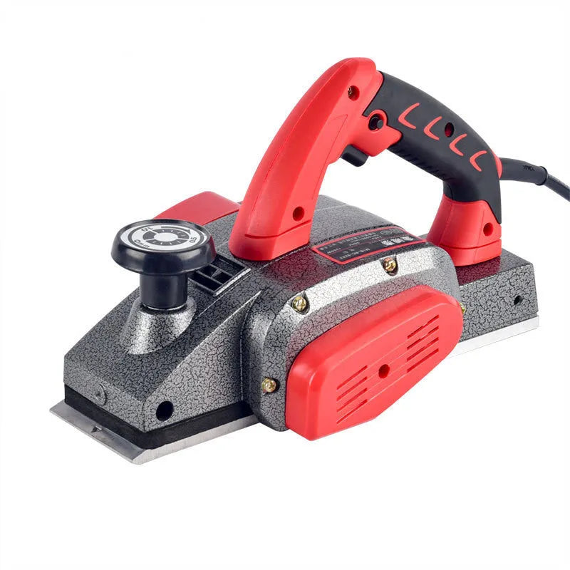 Red desktop electric wood planer with aluminium body showing 82mm planing width and depth adjustment controls