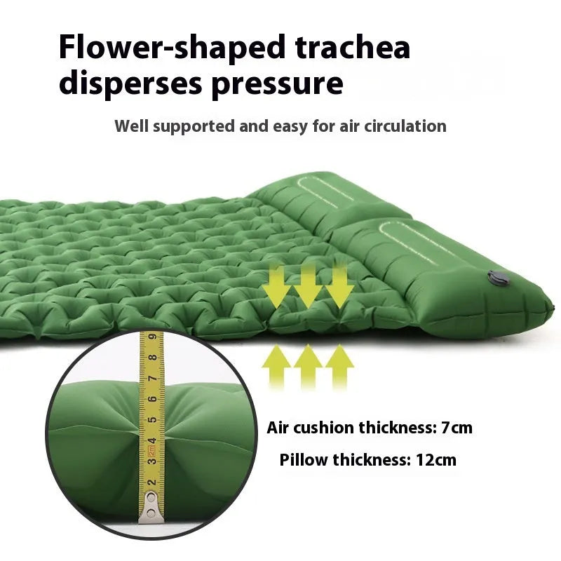 Double-wide camping air mattress with integrated pillow in army green colour, shown inflated.
