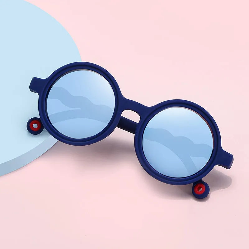 Children's sunglasses with UV400 polarised lens and nylon elastomer frame in seven colours