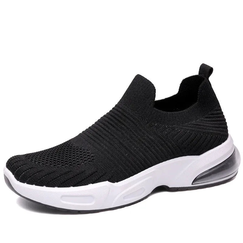 Slip-on breathable sock shoe in a low-top design with a mesh upper and PVC sole.