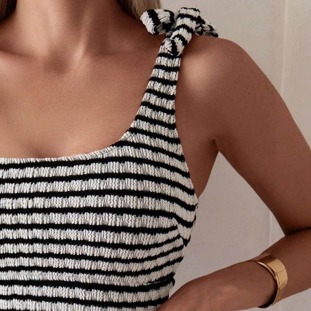 Women's gray striped tube top split swimsuit on mannequin, sleeveless brief style for swimming