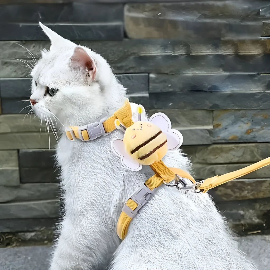 Yellow plaid bee cat harness leash set with adjustable straps on a white background