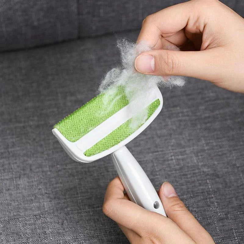 Green plush duster cleaning brush for sofa and pet hair removal