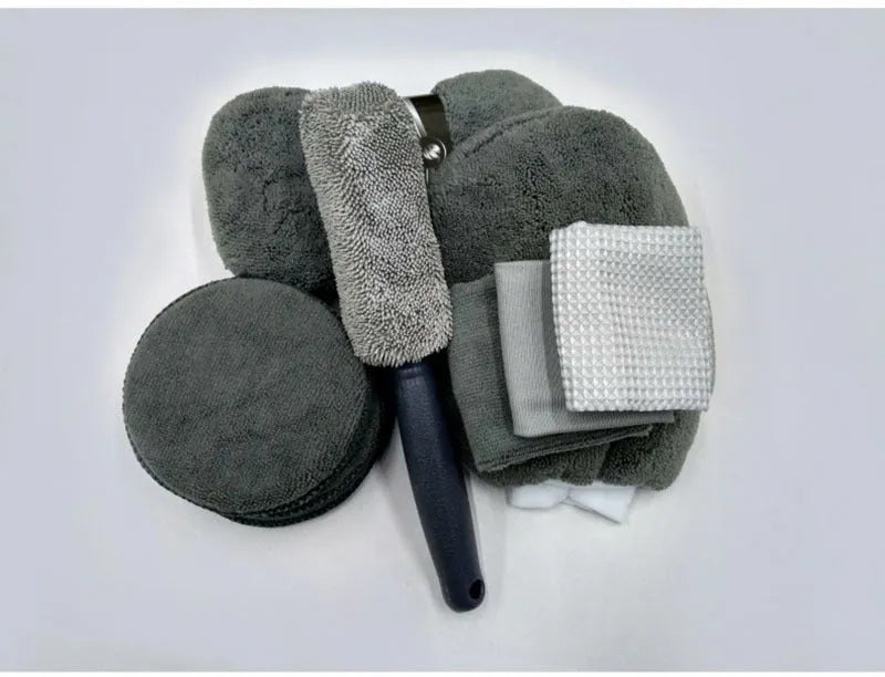 9-piece car wash cleaning kit with tyre brush, microfibre towels, sponge, glove, and waxing cakes in grey and orange