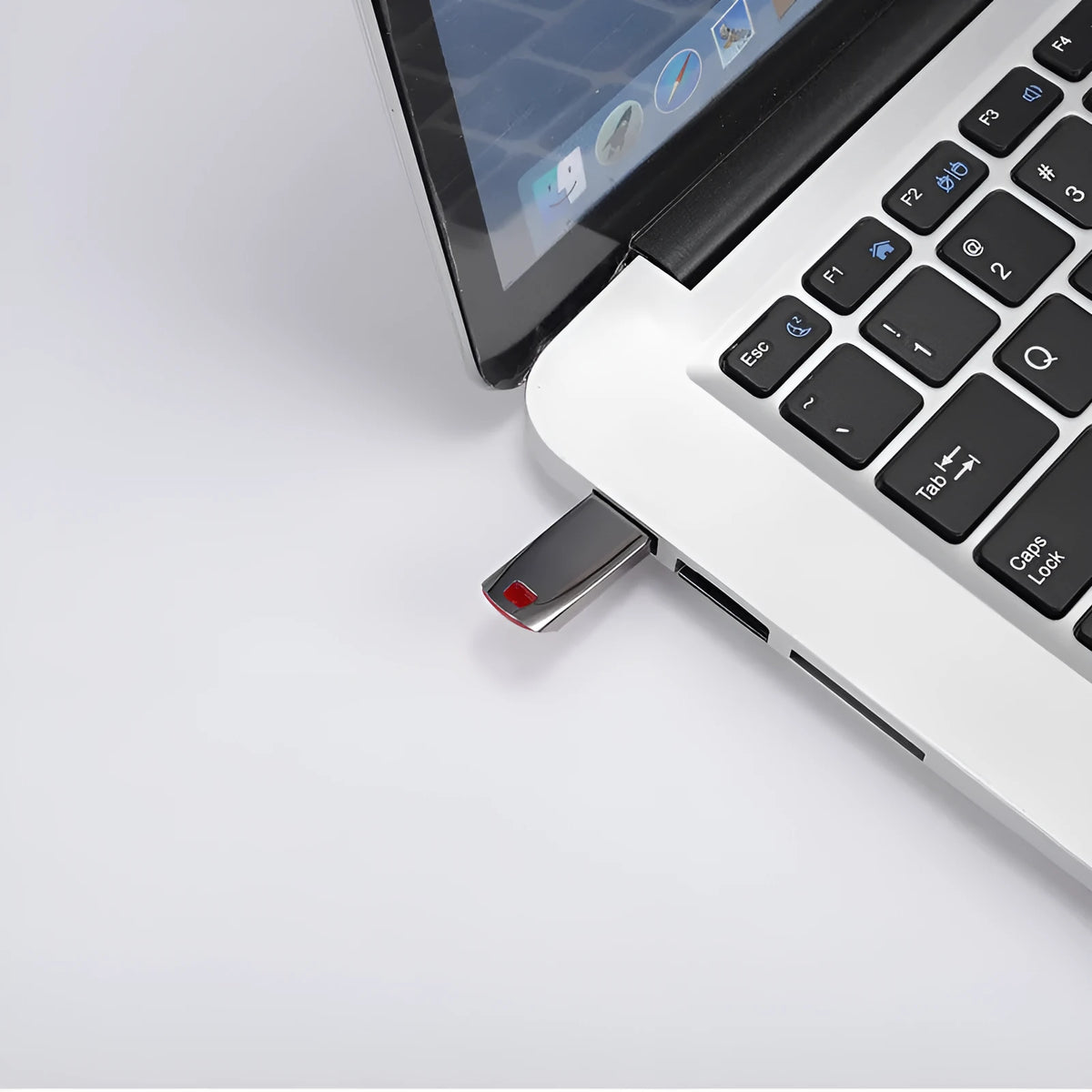 Silver metal USB flash drive with a USB 2.0 connector showing large capacity up to 2TB.