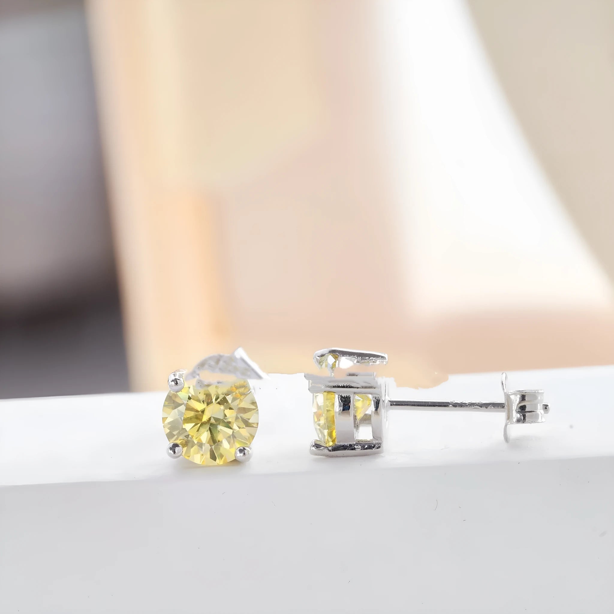 1CTX2 lemon yellow moissanite round stud earrings in silver setting