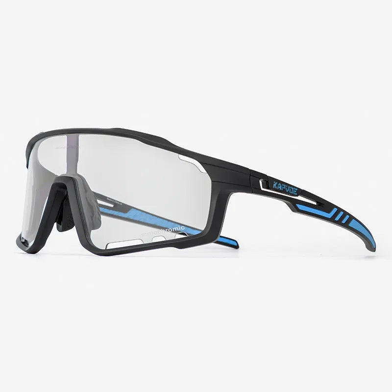 Photochromic cycling sports goggles with semi-rimless TR90 frame on a solid colour background.