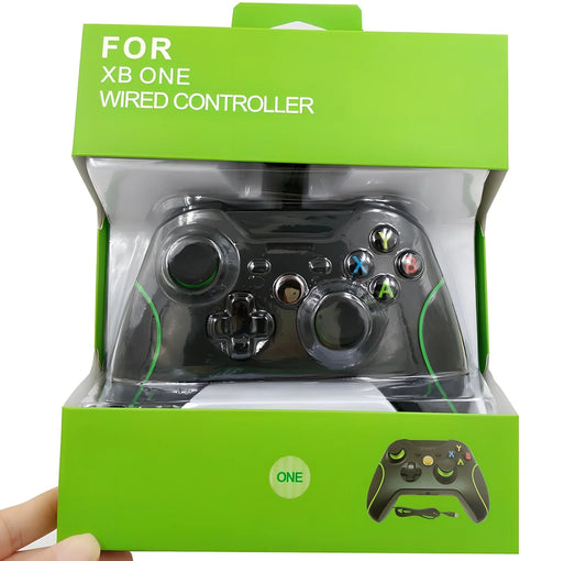 White Xbox One wired USB game controller with ergonomic grips and 2.5m cable on plain background