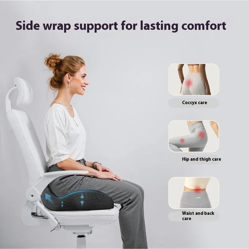 Light grey rectangular memory foam office chair cushion on a desk chair.