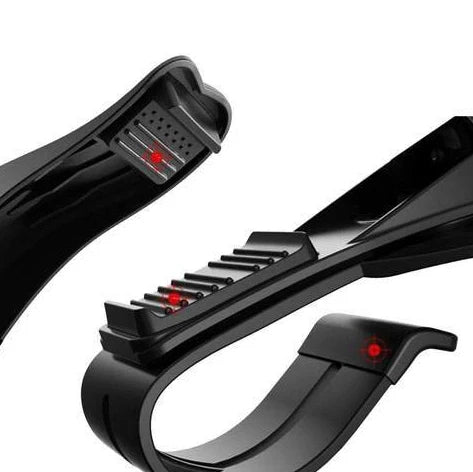 Black magnetic car phone holder with 360-degree rotation mounted on car vent