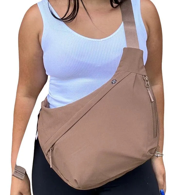 Men's PU canvas shoulder bag with adjustable strap in black, shown on a model for scale
