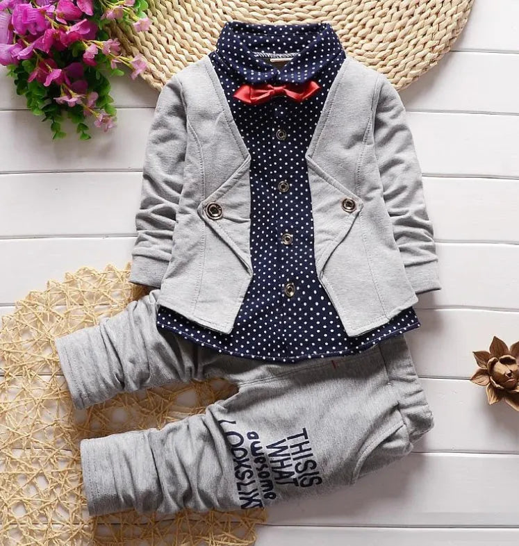 Blue children's casual sport suit tracksuit set with short sleeve top and elastic waist shorts on a hanger.