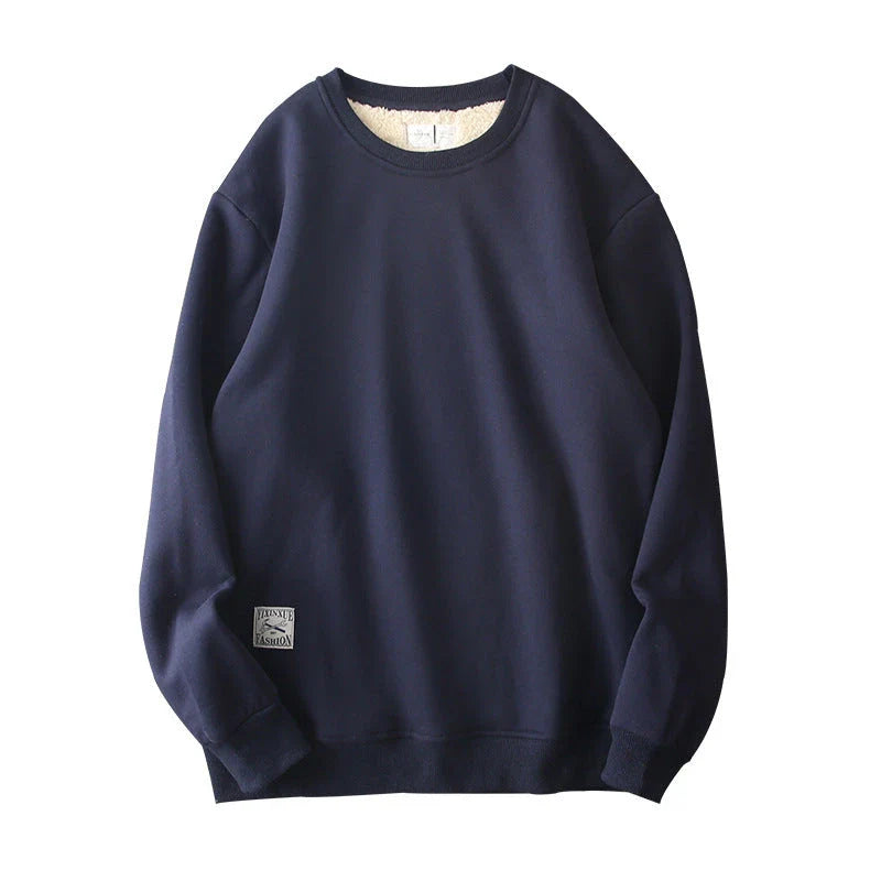 Cozy fleece pullover in various colors for men, featuring a round neckline and long sleeves for warmth and style