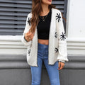Plus size beige knitted coat with jacquard flower pattern, loose fit, cardigan style.
