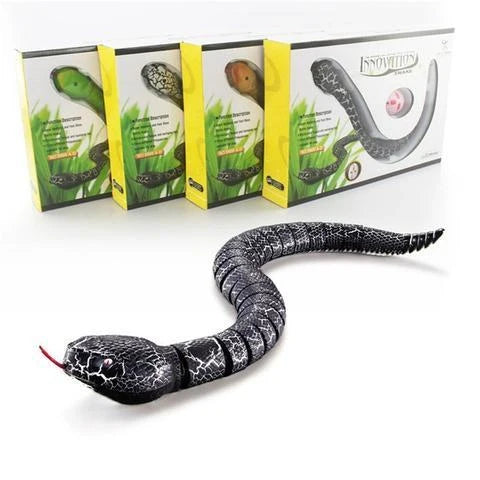 Remote control rattlesnake toy with realistic slithering motion and egg-shaped controller