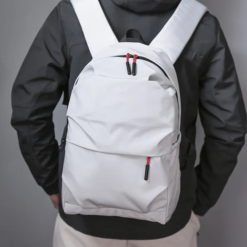 Durable nylon backpack in black and light grey with adjustable straps