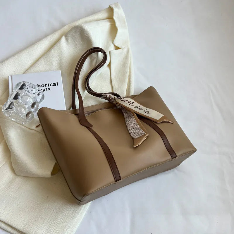 Women's large capacity tote shoulder bag in multiple colour options showing bucket design with sandwich pocket