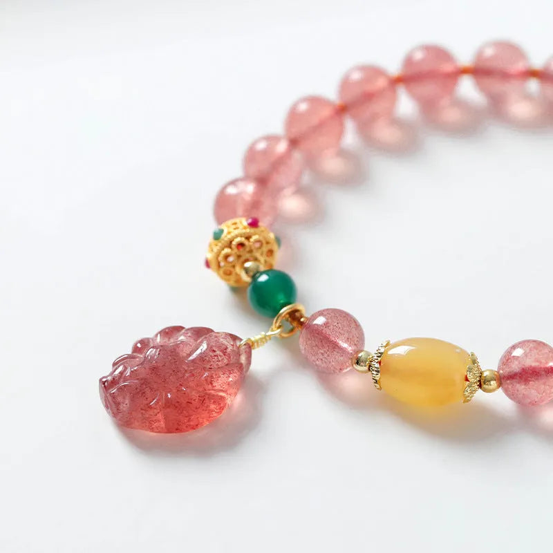 Women's strawberry quartz crystal beaded bracelet with magnetic clasp in a Nine Tail Fox design.