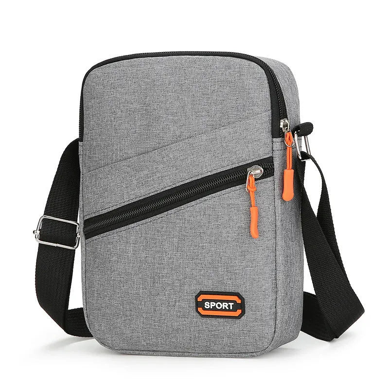 Lightweight solid colour Oxford cloth crossbody commuter bag with contrast detailing