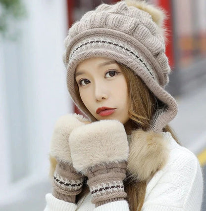 Knit fleece beanie with ear flaps and pompom in various colours for winter warmth