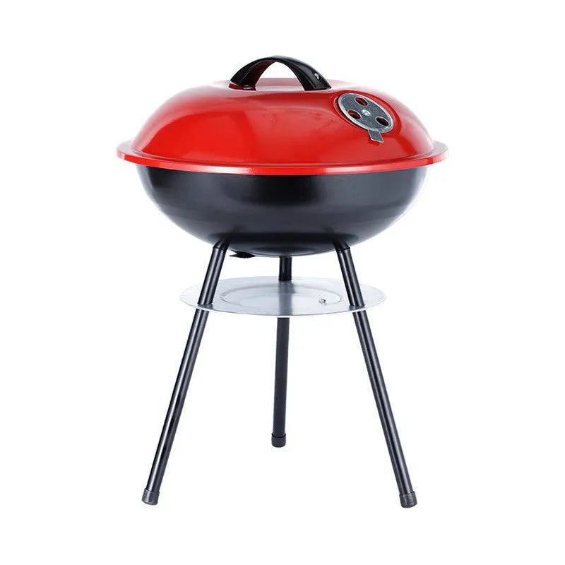Portable 14-inch iron barbecue grill with a minimalist design on a patio.