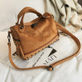 Soft PU leather women's casual tote shoulder bag in black, brown, or grey with zip closure.